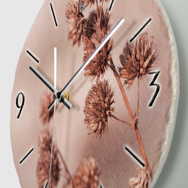 Korbblütler Design-Wanduhr aus Steinguss mit leisem Uhrwerk