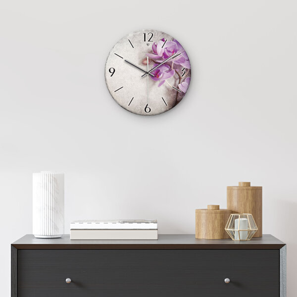 Orchidee Design-Wanduhr aus Steinguss mit leisem Uhrwerk